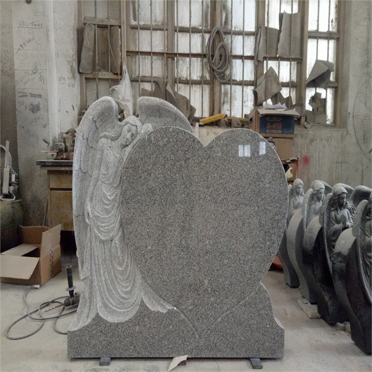 Headstone with angel wings